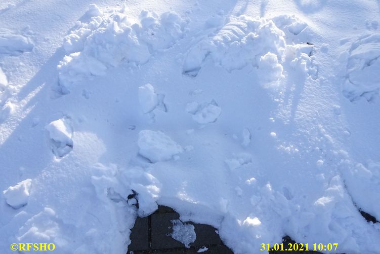 Unterflurhydrant mit Schnee bedeckt